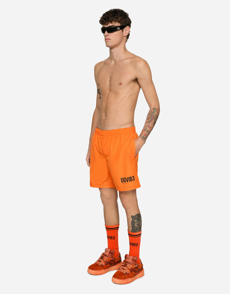 Dolce & Gabbana Mid-length swim trunks with DGVIB3 print and logo Orange M4F25TFUSFW
