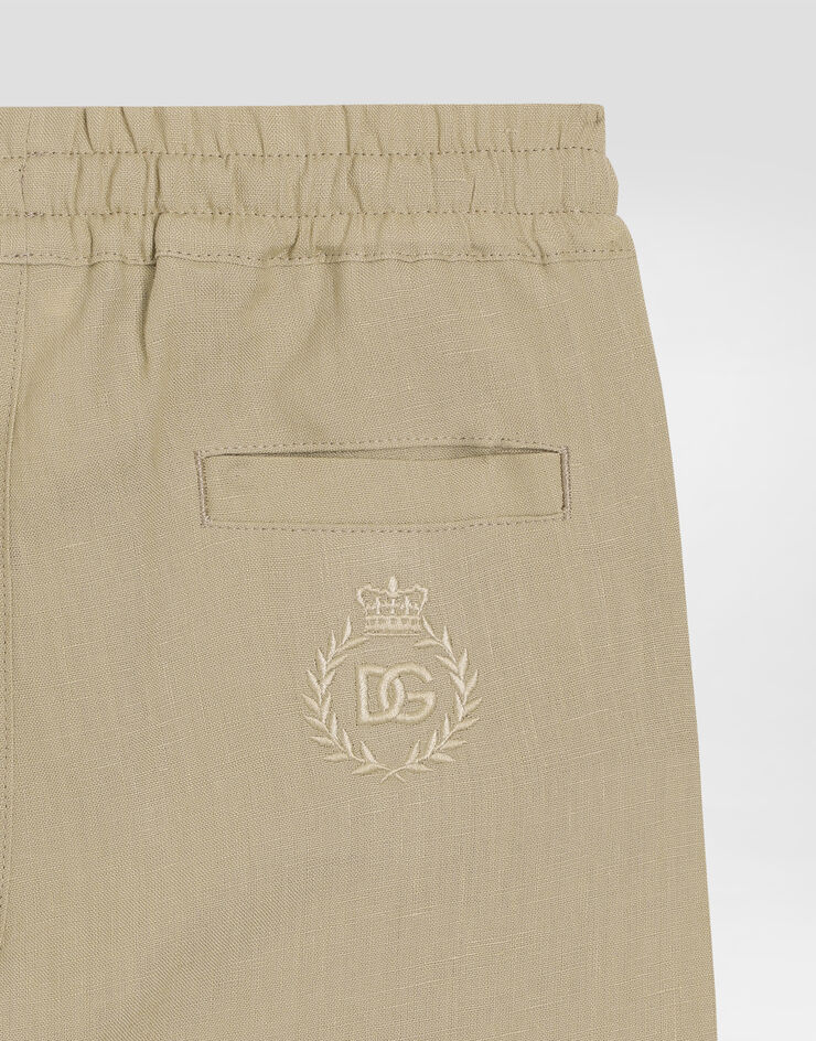 Dolce & Gabbana Pantaloni in lino con logo DG ricamato Beige L44P86G7O9A