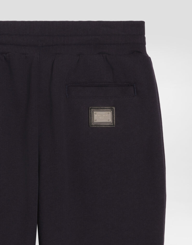 Dolce & Gabbana Fleece trousers with logo plate Blue L4JPT0G7P1V