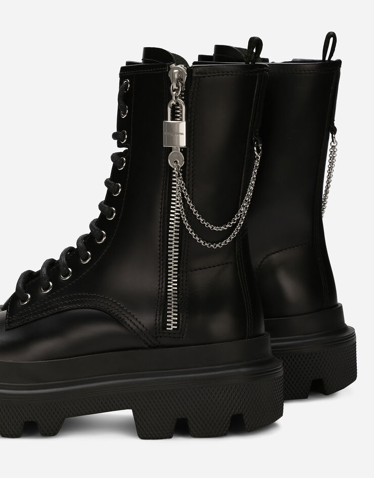 Dolce & Gabbana حذاء بوت برقبة للكاحل من جلد عجل أسود CT1025AB640