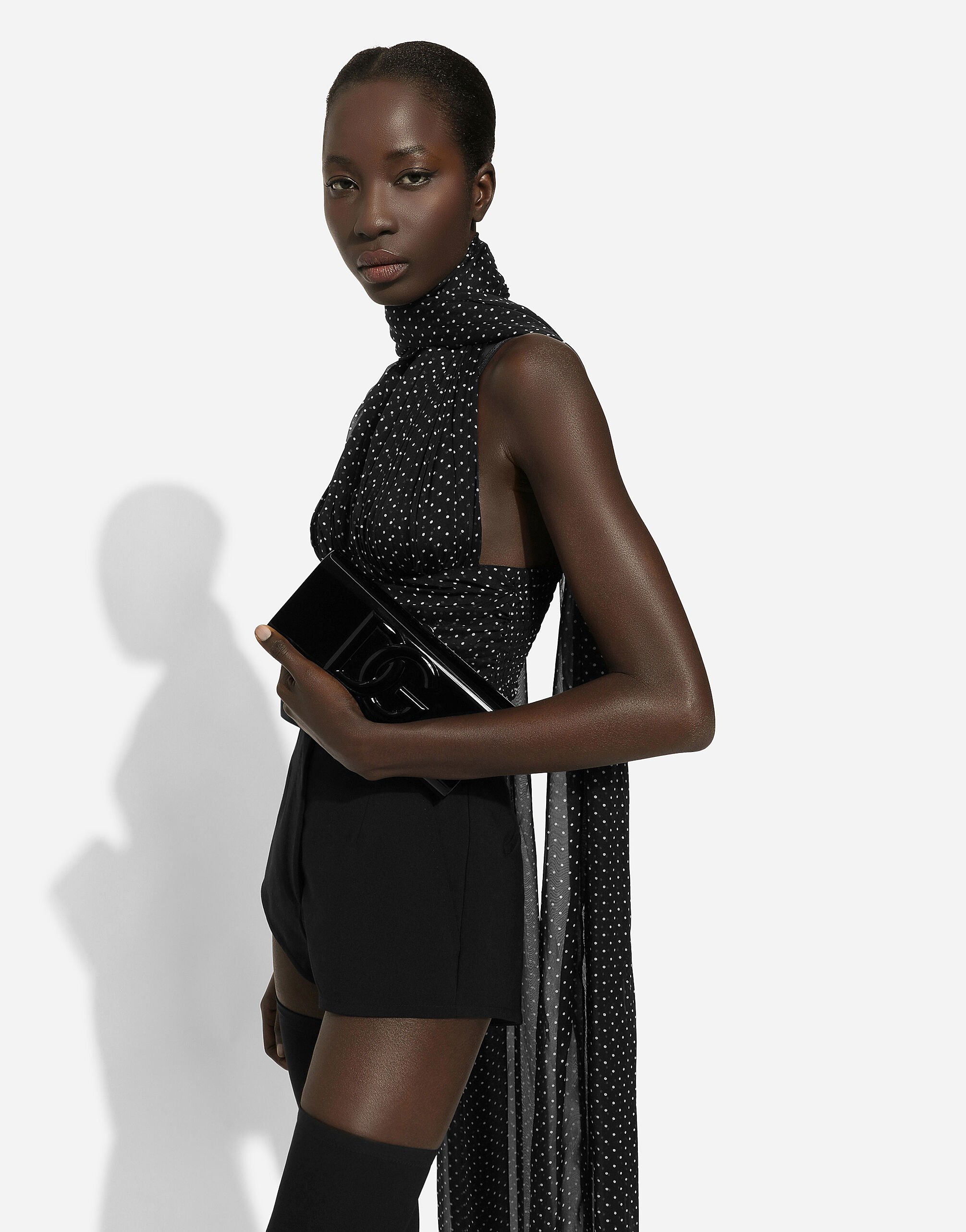 Black dress with clutch clearance