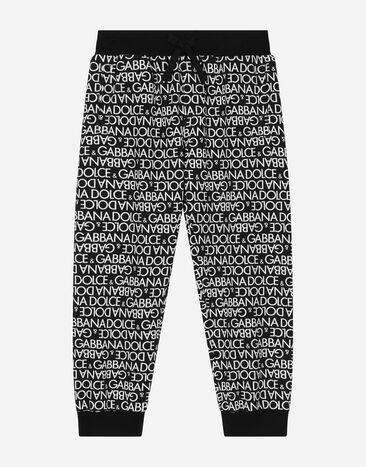 DolceGabbanaSpa Pantalón de chándal de algodón con estampado Logomania Multicolor L4JPFEHS7MN