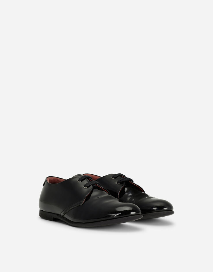 Dolce & Gabbana حذاء ديربي من جلد لامع أسود DA0250A1328