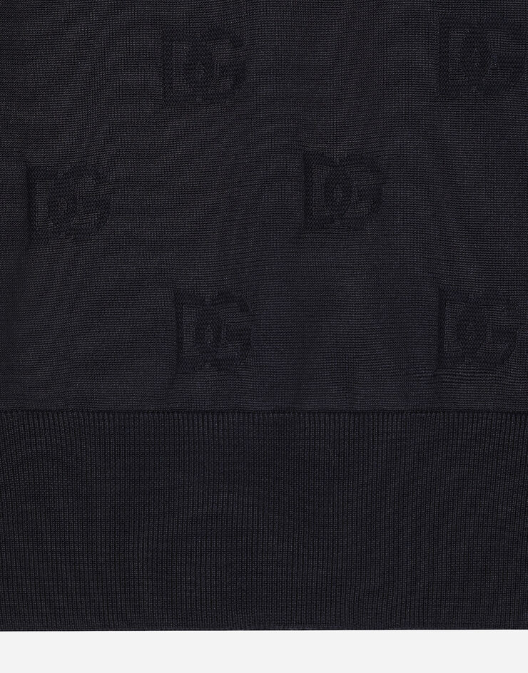 Dolce & Gabbana Jersey de cuello redondo de seda con motivo integral DG en intarsia Azul GXX02TJAST6