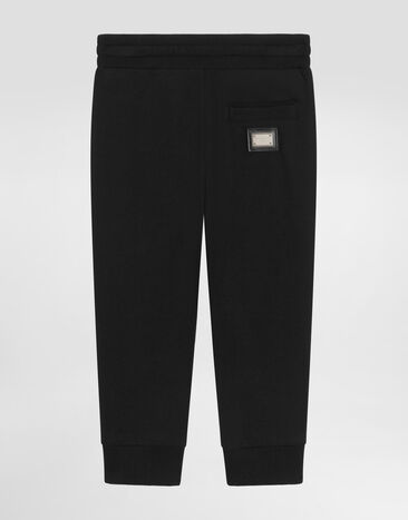 Dolce & Gabbana Fleece trousers with logo plate Black L4JPT0G7P1V