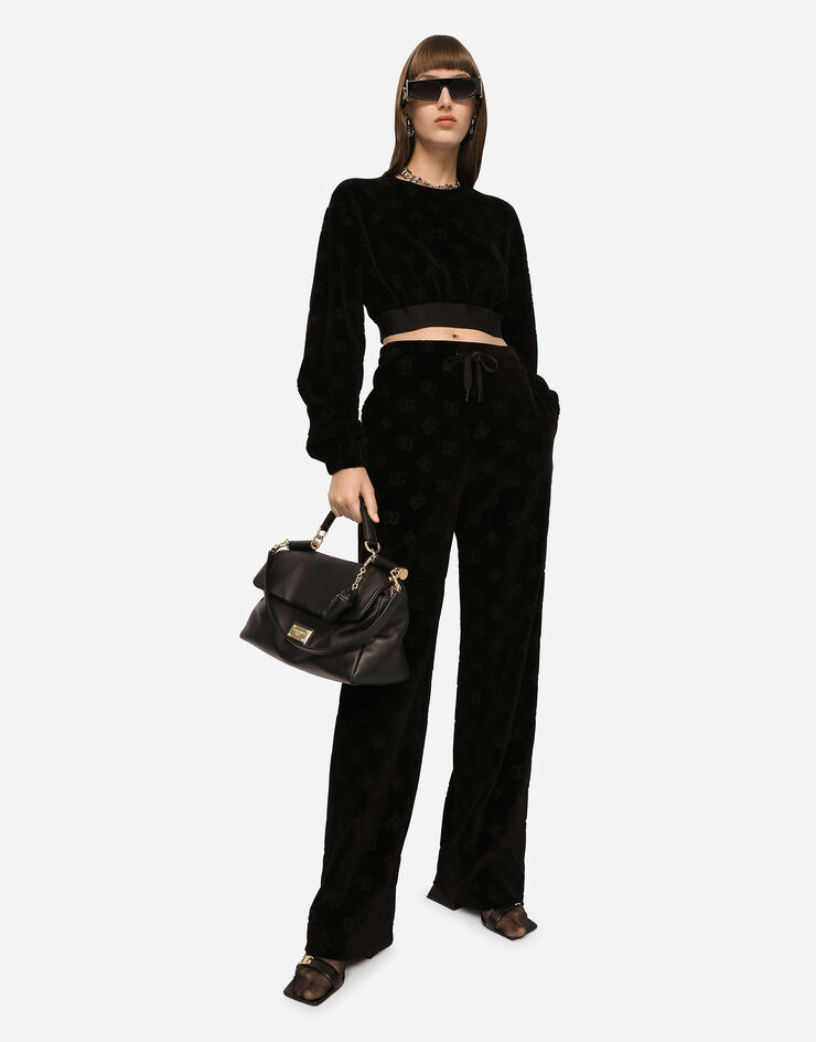 Flocked jersey pants with all-over DG logo in Black for | Dolce&Gabbana® US