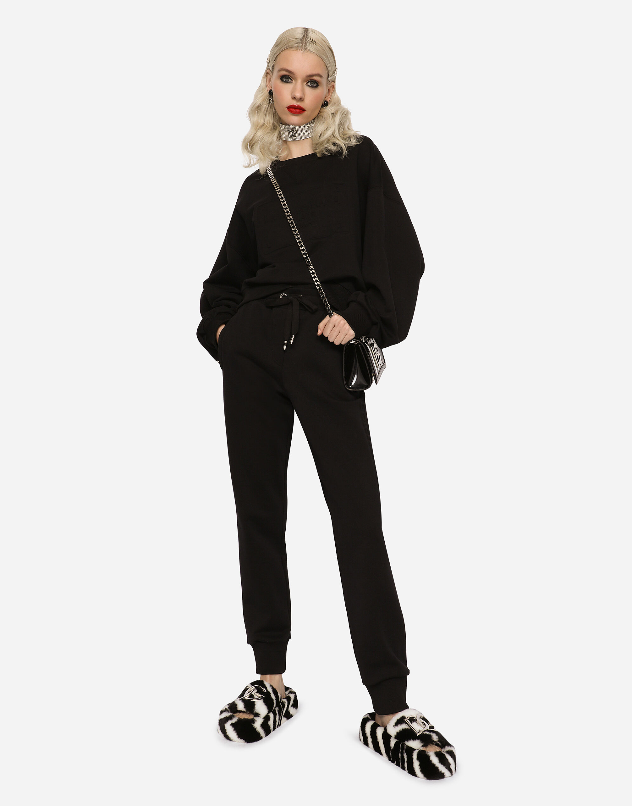 Jersey jogging pants with embossed logo in Black for
