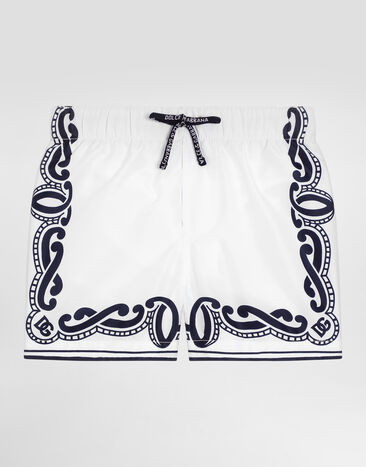 Dolce & Gabbana Fabric swim trunks with bandanna print Blue L1J818ON03Y