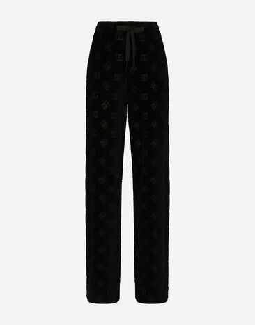 Dolce & Gabbana Flocked jersey pants with all-over DG logo Black FTCKJTFJ7DL