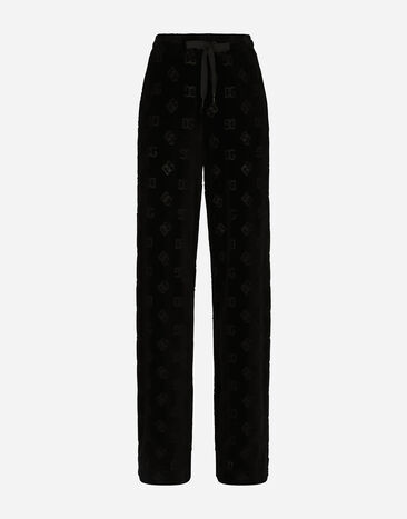 Dolce & Gabbana Flocked jersey pants with all-over DG logo Black FTCHMTFURJL