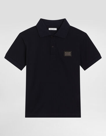 DolceGabbanaSpa Polo en piqué avec plaquette à logo Bleu L4JTCXG7JS1
