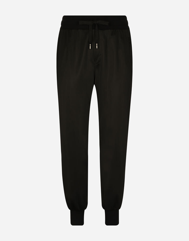 Dolce & Gabbana Pantalón de chándal en punto técnico con placa Negro GVXQHTHU7B0