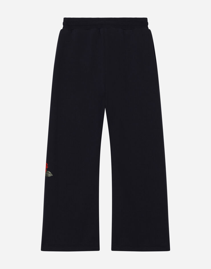 Dolce&Gabbana Pantalón de chándal en punto con estampado de logotipo y rosas Azul L5JPB2G7J7V