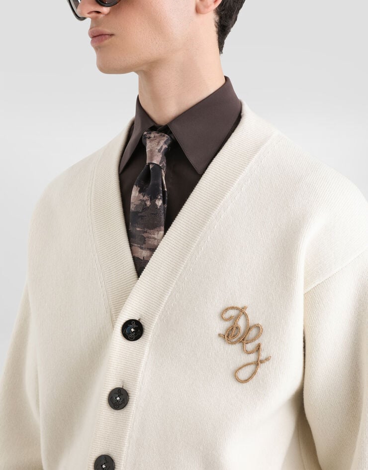 Dolce & Gabbana Cárdigan en lana virgen con logo Dolce & Gabbana Cárdigan en lana virgen con logo Blanco GXVGQZJDVGI