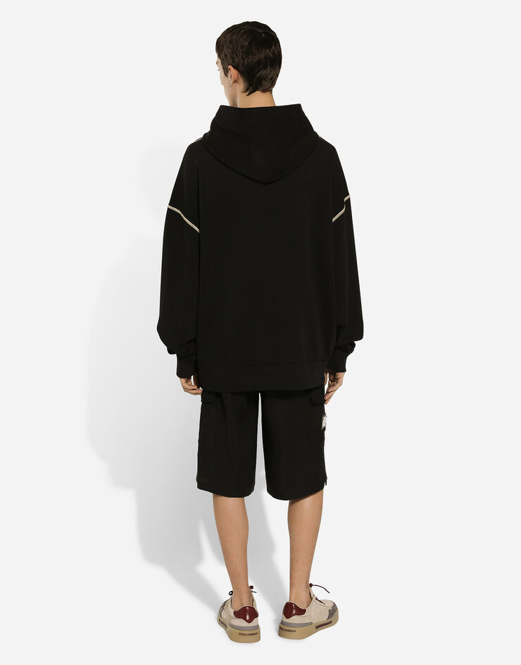 Dolce & Gabbana Sweat-shirt oversize avec capuche et logo Noir G9AJATG7NQC