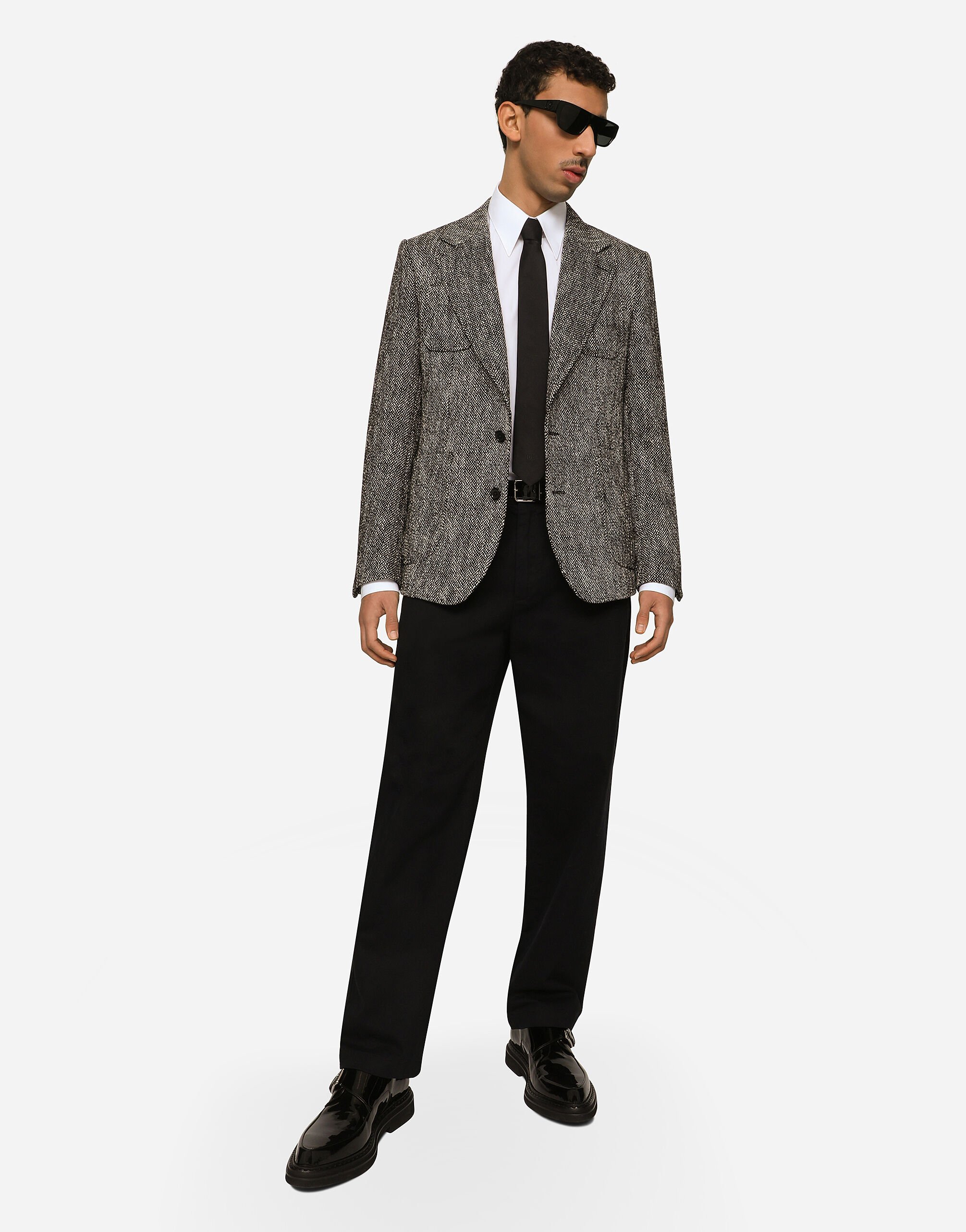 Single breasted herringbone cotton and wool tweed jacket in