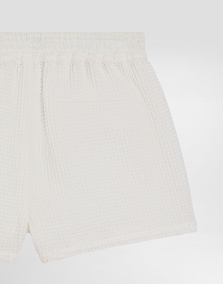 Dolce & Gabbana Cotton waffle bermuda shorts Dolce & Gabbana Cotton waffle bermuda shorts White L13Q97FU628