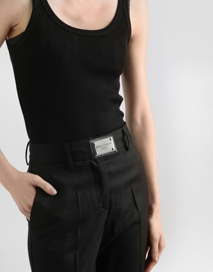 Dolce&Gabbana Flared flannel pants with logo tag Black FTCZITGDBWV