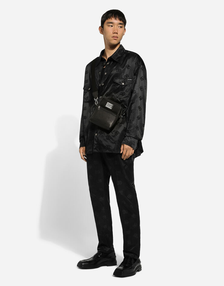Dolce & Gabbana حقيبة كروس بودي محببة من جلد عجل ونايلون أسود BM2302AD447