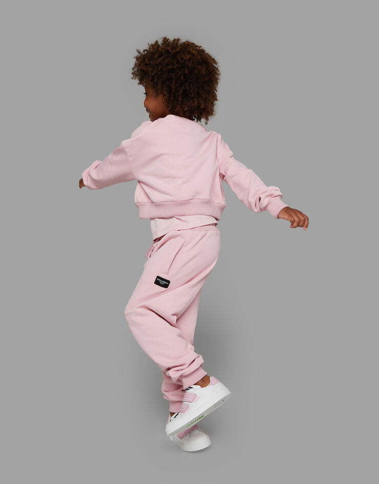 Dolce & Gabbana Pantaloni jogging in jersey con patch logo Rosa L5JPD7G7M4V