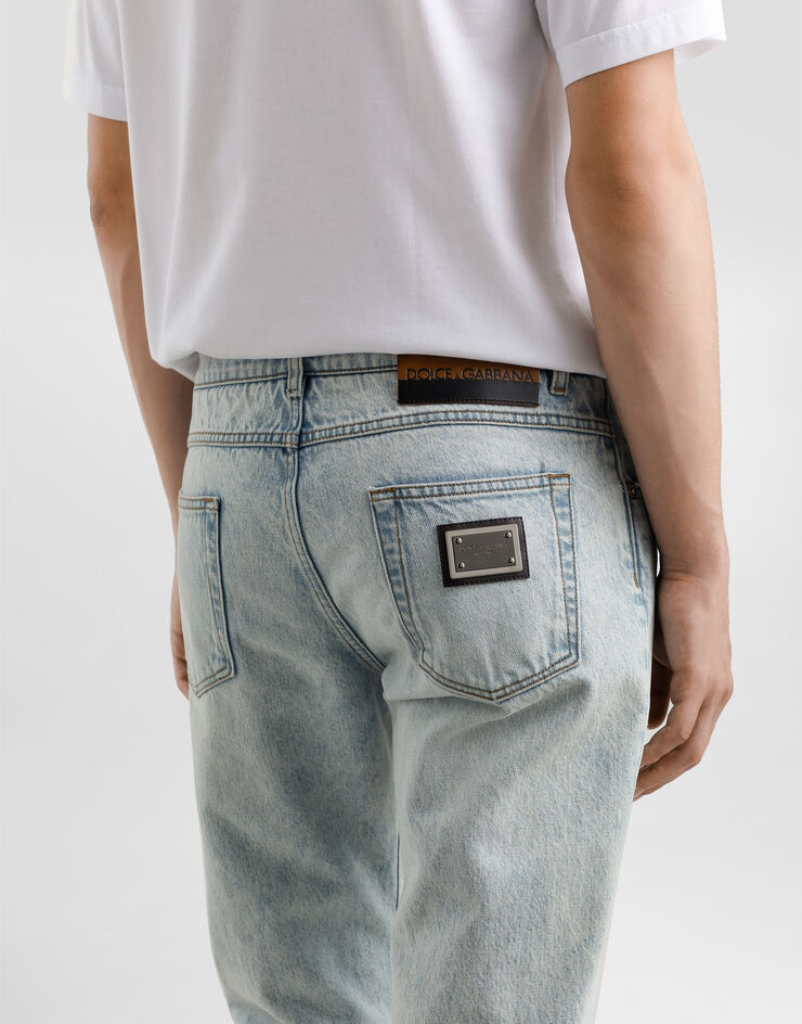Dolce & Gabbana Jeans Regular aus Baumwolle mit Plakette Mehrfarbig GYJCCDG8MU1