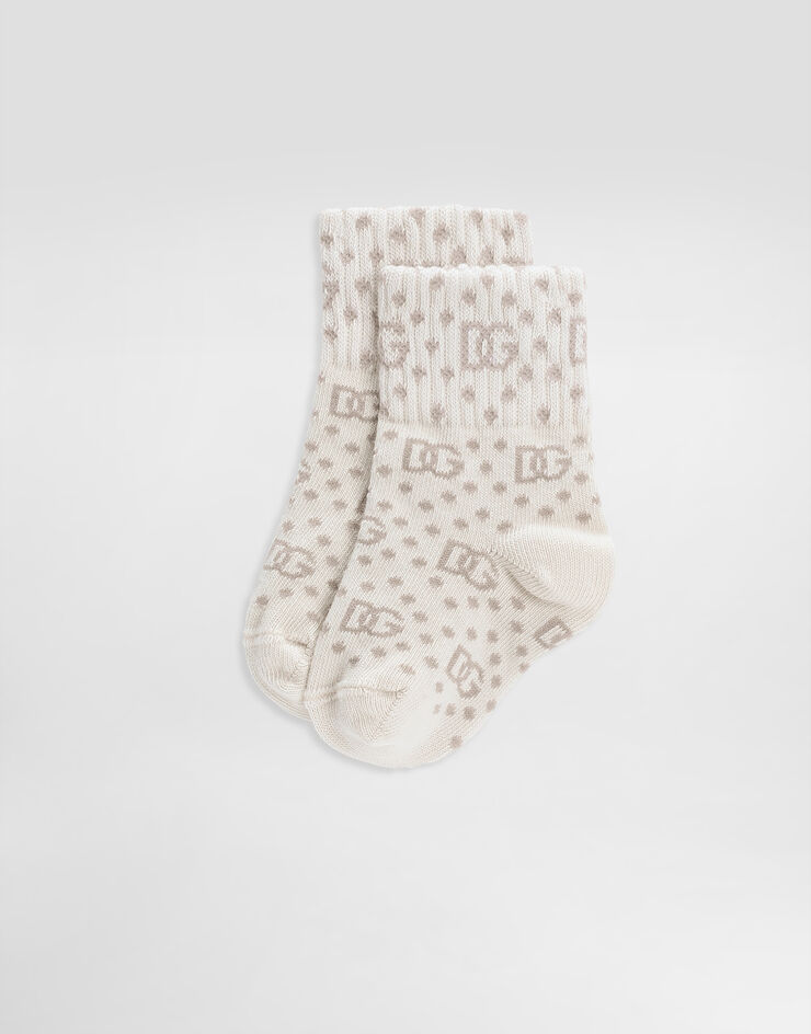 Dolce & Gabbana Calcetines de punto jacquard con logotipo DG y lunares Beige LNKAG4JBCGB