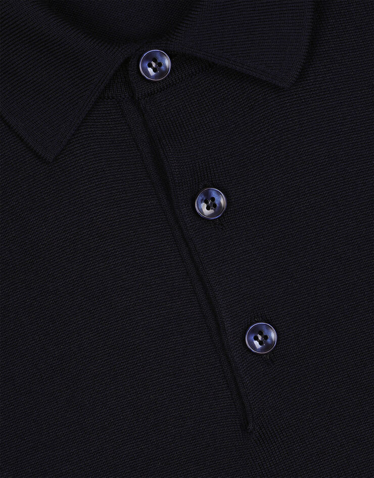 Dolce & Gabbana Poloshirt aus Wolle mit Logoplakette Blau GXO38TJCVC7