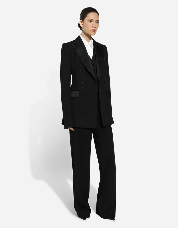 Dolce & Gabbana Pantalón acampanado en gabardina de lana Negro FTC18TFU28J