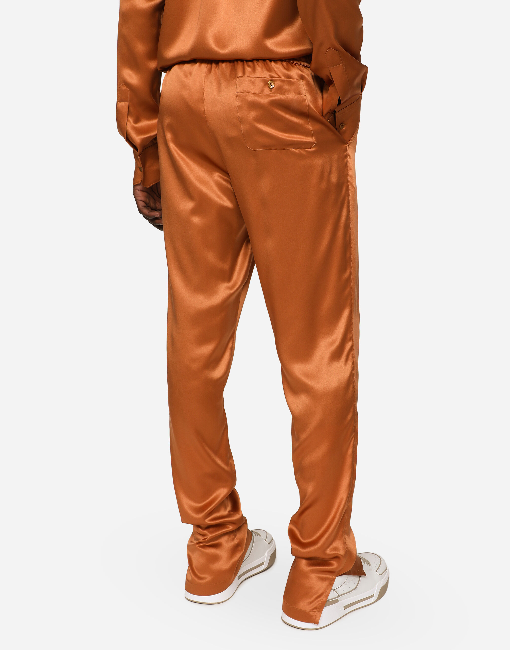 Silk satin jogging pants with metal DG logo in Beige for