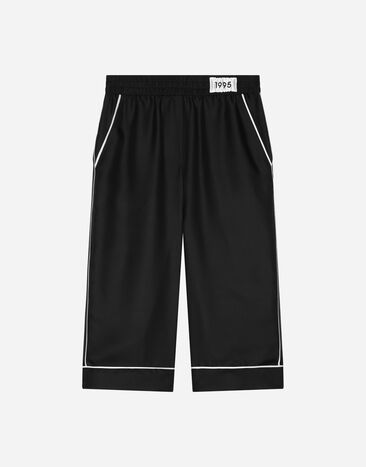 Dolce & Gabbana Pantalón tipo pijama en sarga de seda Negro L53P26FU1FZ
