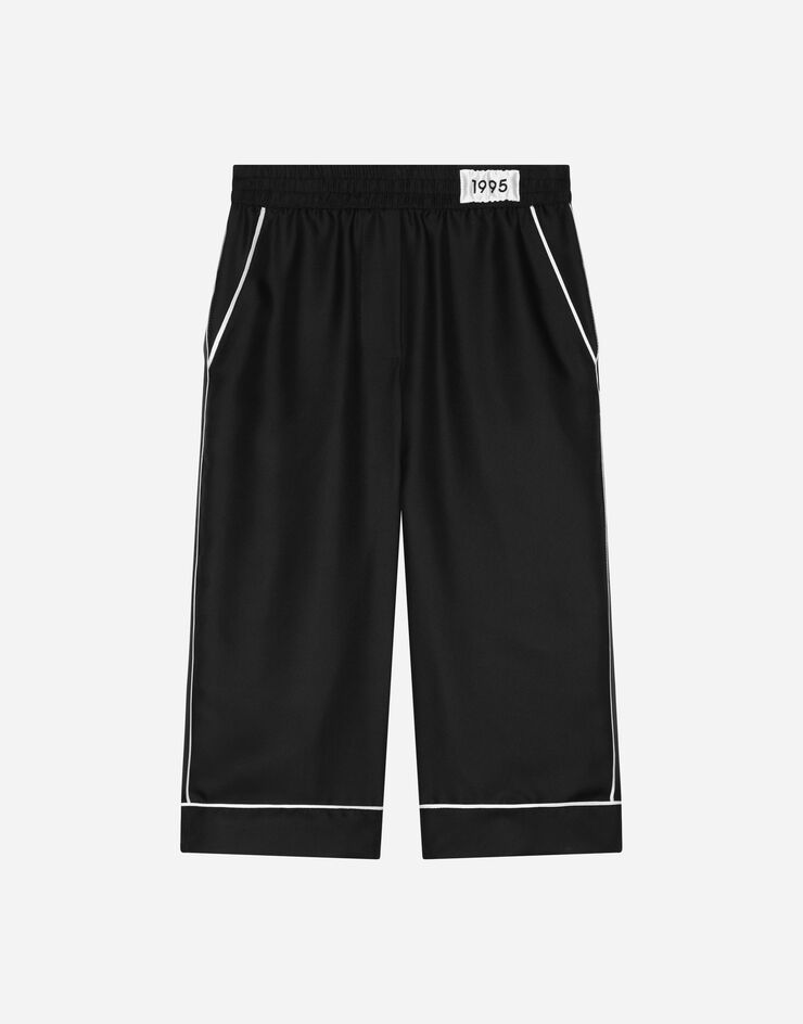 Dolce & Gabbana Pantalón tipo pijama en sarga de seda Negro L53P26FU1FZ