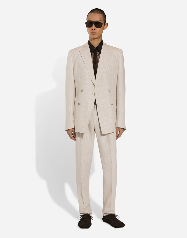 Dolce & Gabbana Chaqueta Portofino de botonadura doble de lino con rayas diplomáticas Multicolor G2NZ2TFR4BP