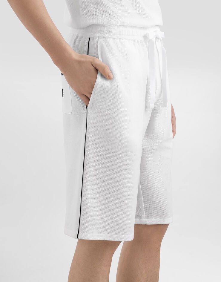 Dolce & Gabbana Hose aus Baumwollpiqué Weiss GV5MAZHU7UT