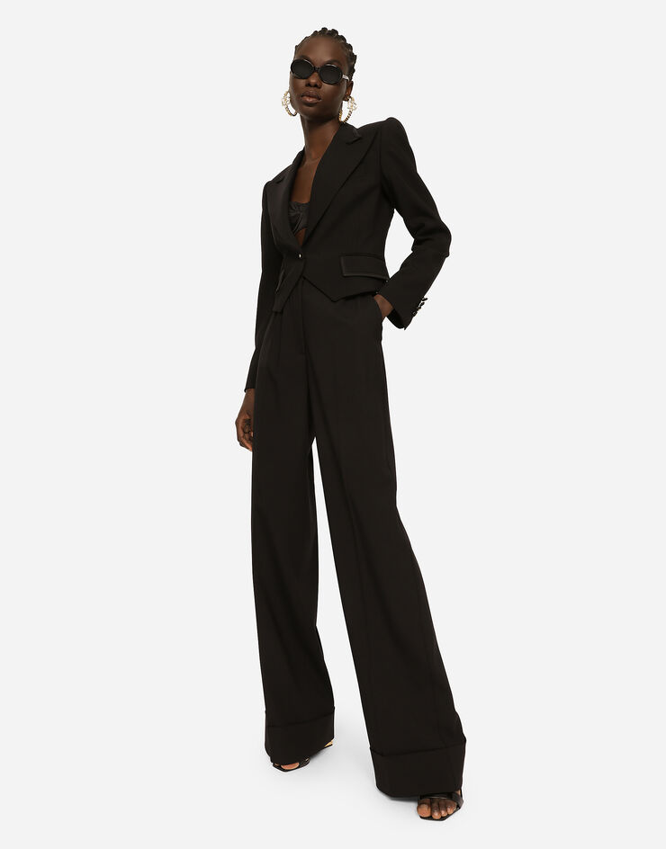 Dolce & Gabbana Pantalones palazzo en tela de lana con dobladillo Negro FTBM0TFUBAJ