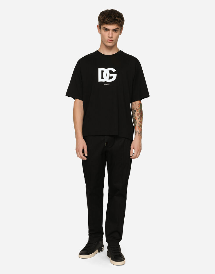 Dolce & Gabbana Pantalone jogging in cotone stretch con placca Nero GYACETFUFIS