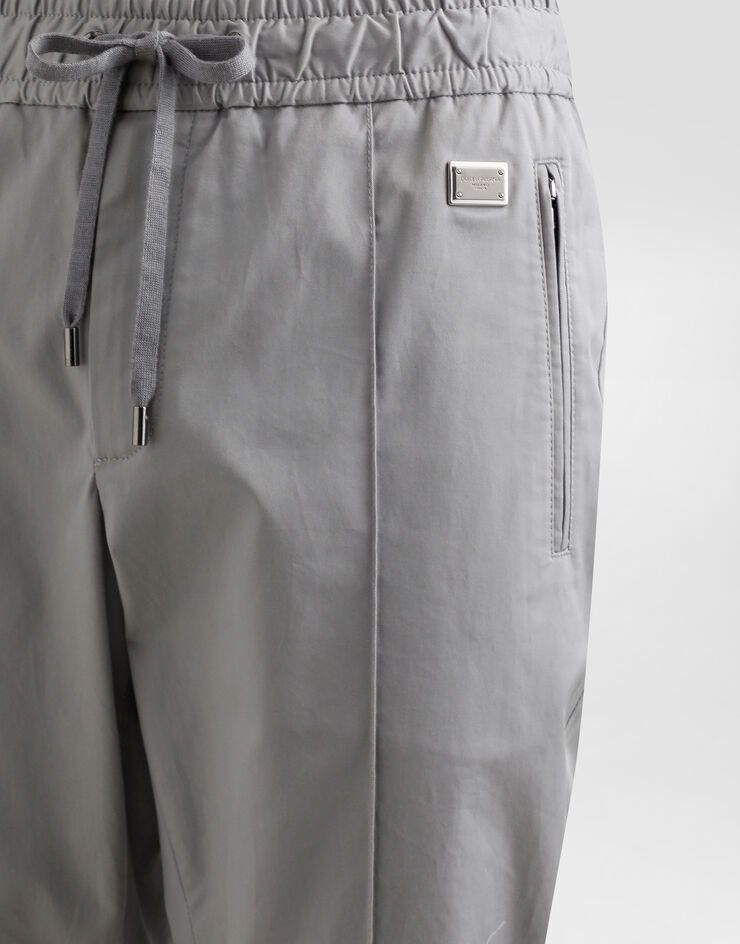 Dolce & Gabbana Pantalón de chándal de algodón con placa Gris GYACETFUFNV