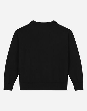 DolceGabbanaSpa Round-neck plain knit sweater with logo tag Black L4KWE2JCVM4