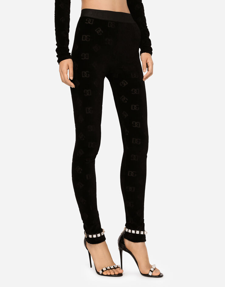 Dolce & Gabbana Leggings aus beflocktem Jersey mit DG-Logo allover Schwarz FTCQKTFJ7DL