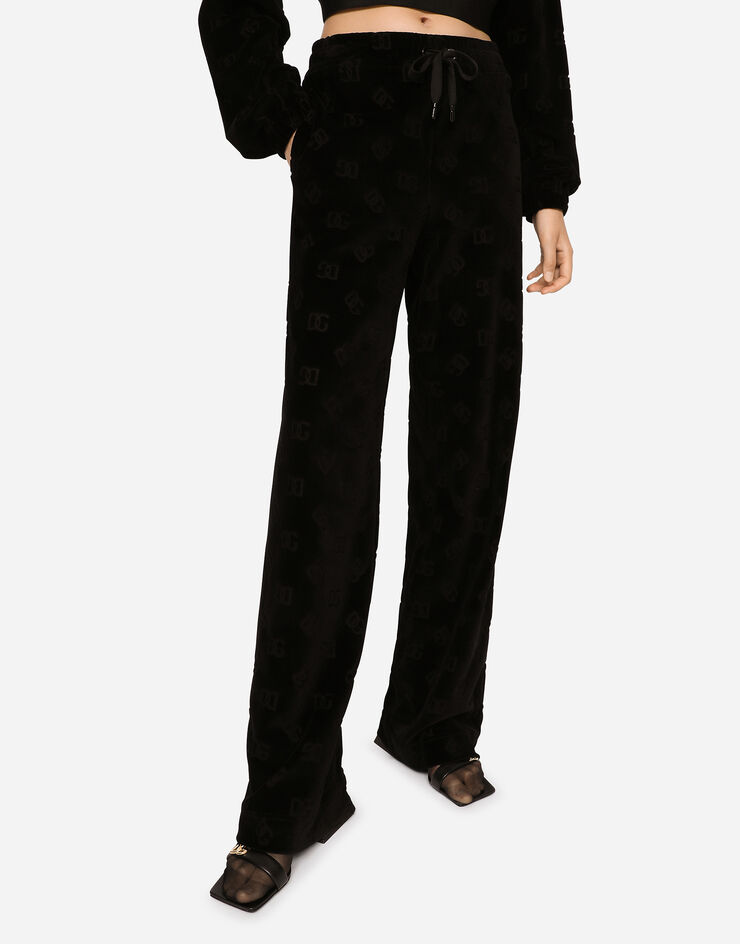 Dolce & Gabbana Flocked jersey pants with all-over DG logo Black FTCKJTFJ7DL