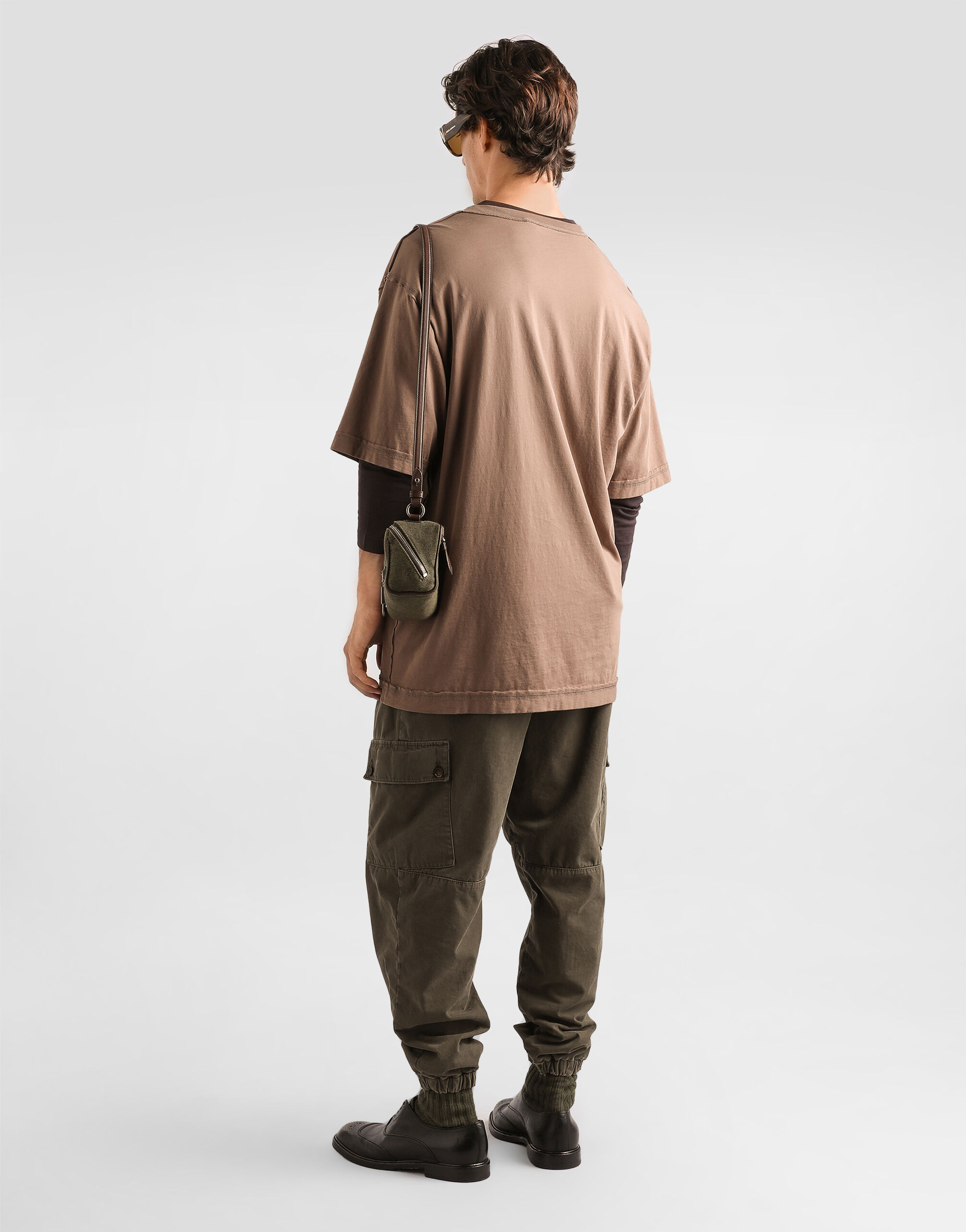 Resin-coated gabardine trousers