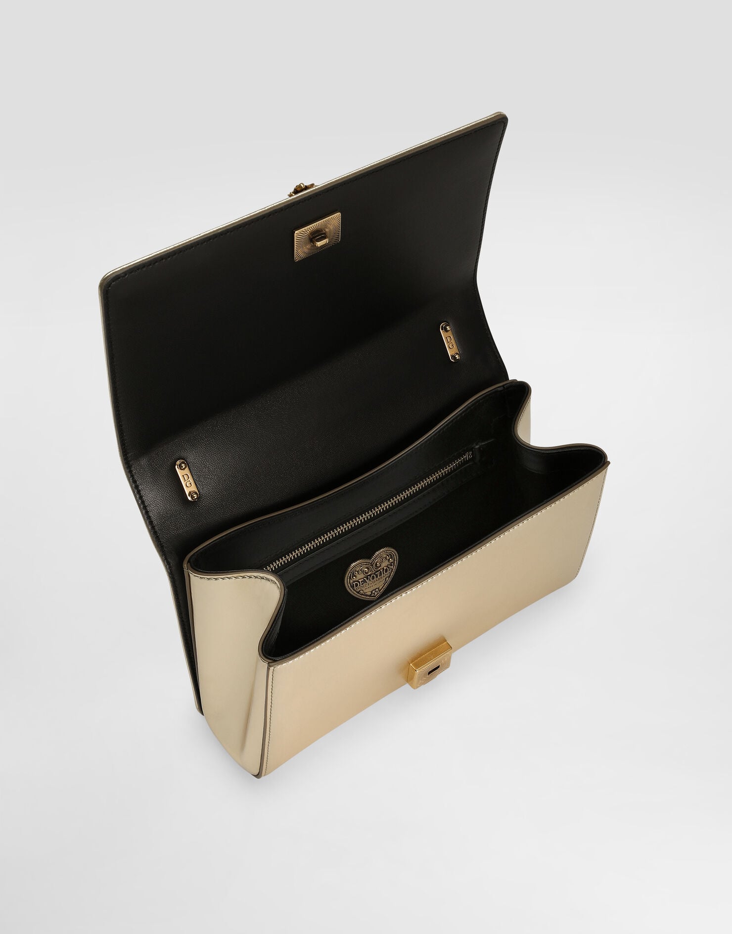 Open gold Dolce & Gabbana Devotion Bag showing its interior compartments.