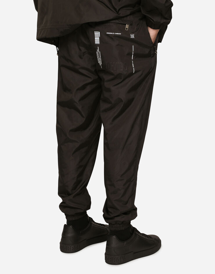 Dolce & Gabbana Light nylon jogging pants with DGVIB3 print Black GVTCHTGH398