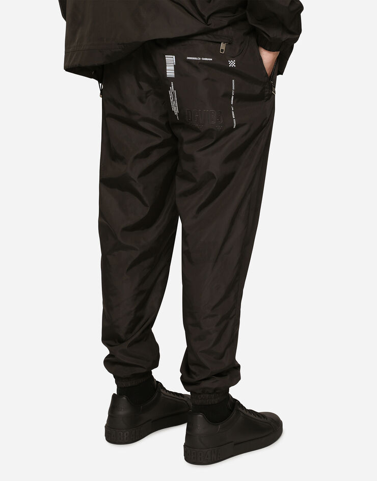 Dolce & Gabbana Jogginghose leichtes Nylon Print DGVIB3 Schwarz GVTCHTGH398