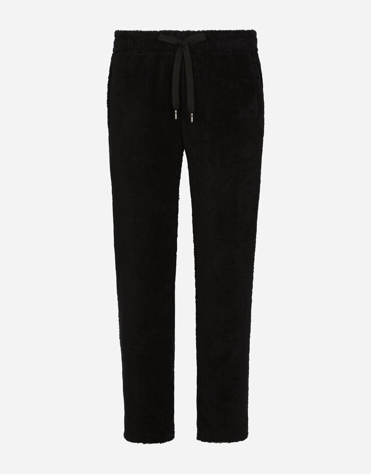 Dolce & Gabbana Jogginghose aus Frottee mit Plakette Schwarz GV1IATHU7OC