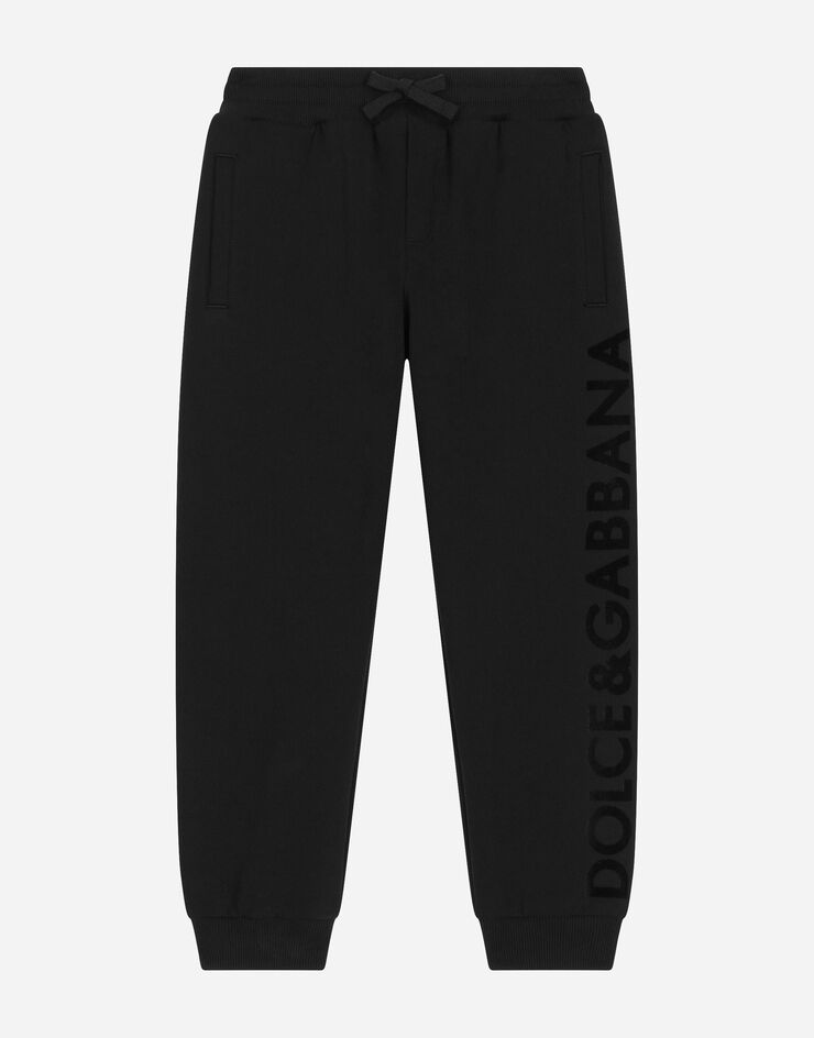 Dolce&Gabbana Pantalón de chándal de punto con logotipo aterciopelado Negro L4JPFEG7K2C