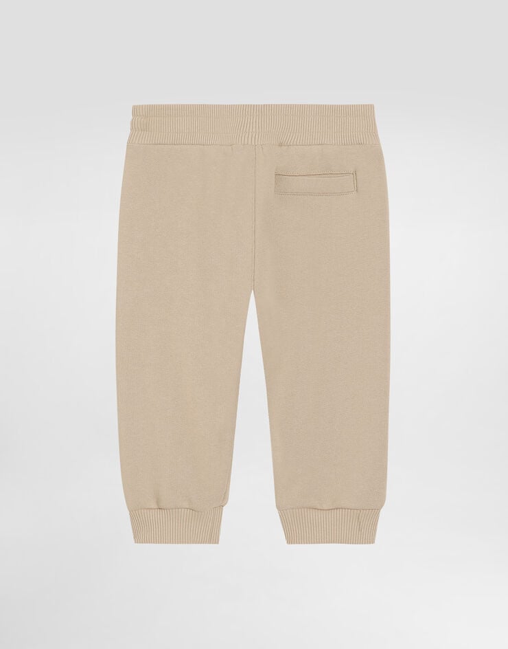 Dolce & Gabbana Fleece trousers with Dolce&Gabbana embroidery Beige L1JPKVG7PEQ