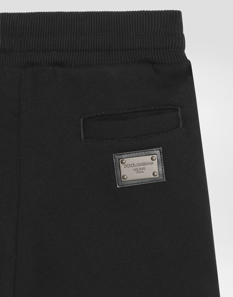 Dolce & Gabbana Bermudas de chándal en punto con placa con logotipo Negro L4JQD4G7I2P