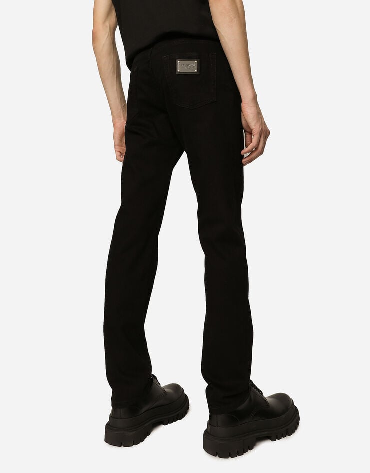 Dolce & Gabbana جينز أسود مرن مغسول بقصة ضيقة متعدد الألوان GY07CDG8HD1