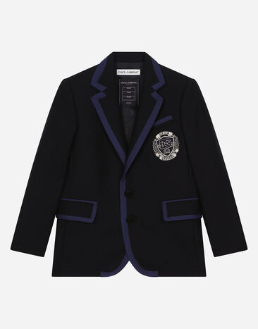 Dolce & Gabbana Giacca monopetto in lana con bordatura a contrasto e logo DG Blu L41J81G7NMP