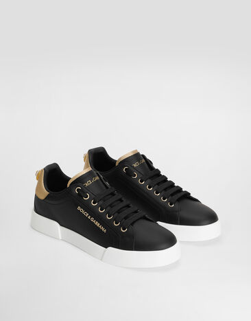 Dolce & Gabbana Sneakers Portofino en cuir de veau nappa à lettering Noir/Doré CK2329AN298